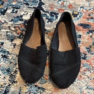 TOMS Black Burlap Slip-ons